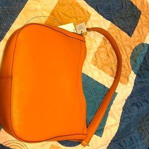 New Day purse with extra strap. New with tag.